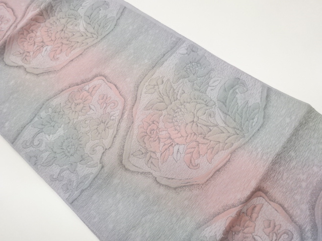 Honjo Chikuzen Hakata Nagoya obi with a woven pattern of flowers in a variegated